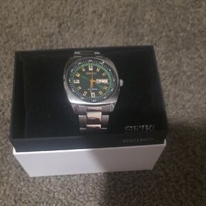 Seiko Silver Watch with Green and Orange Dial